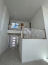 Great Room Looking Onto The Foyer (Pictures Are Not Of Actual Home)
