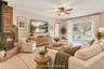 Virtually Staged Den With Wood Burning Fireplace