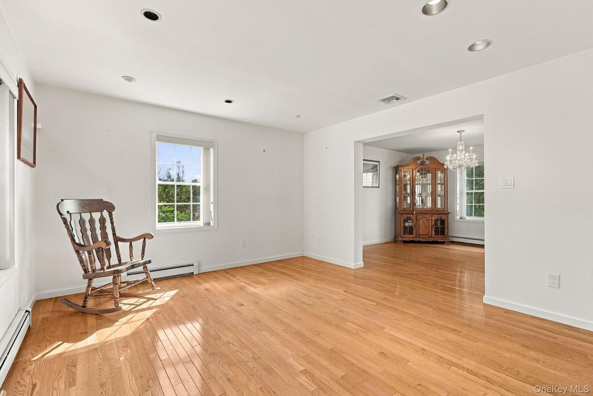 The logical flow from space to space will make your new home work well for you. This living room could also double up as a great home office/library.