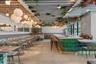 Indoor Portion of the poolside restaurant curated by James Beard Award-winning Chef Michelle Bernstein at Five Park Miami Beach.
