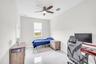 Guest bedroom with ceiling fan