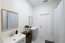Bathroom with vanity and shower