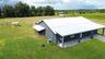 New 2025 CBS home with metal roof and covered porches