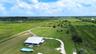 Aerial of the home and surrounding acreage