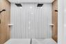 Primary shower with dual showerheads
