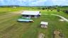 Aerial of the home with pool and guest unit