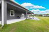 Covered porch overlooking the open acreage