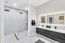 Primary bath with double vanity and oversized walk-in shower