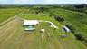 Aerial of the homesite and curved drive