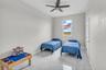 Guest bedroom with ceiling fan