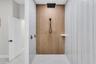 Spa-style walk-in shower with rain showerhead