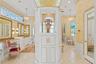 Primary Ensuite Bath has separate Vanities, Water Closets and Wardrobes.