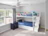 Carpeted room with a ceiling fan
