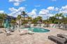 Pool is surrounded by lots of area to relax and enjoy.