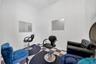 Room with two barber chairs