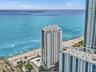 Experience luxury oceanfront living at Apogee Beach, featuring direct beach access, resort-style pools, and amenities, and exceptional coastal lifesty