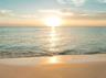 Sandy shoreline featuring direct ocean access