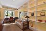 Den or office with built-in shelving.