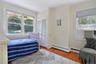 Sunny bedroom with closet