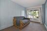 Second lower level bedroom with sliders to patio