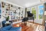 Formal entertaining area with built in bookshelves