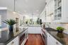 Kitchen with Oversized island Wolf and Subzero appliances, Bosch dishwasher and wine fridge