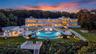 Estate aerial at twilight (virtually enhanced twilight/night rendering)