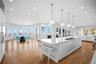 Kitchen and great room (digitally enhanced)