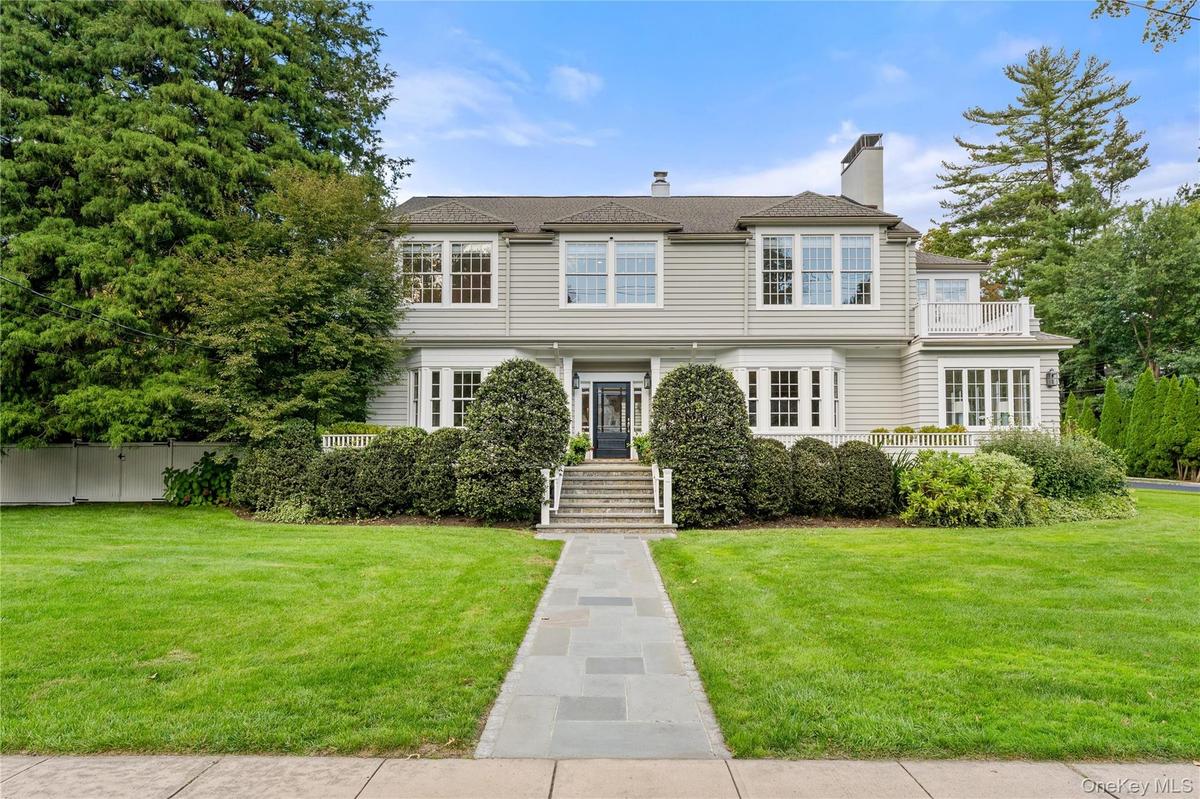 Updated and expanded Colonial in the heart of the sought-after Larchmont Gardens, affectionately known as The Brook