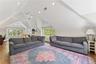 Recreation/office/playroom with soaring cathedral ceiling perfect for guest and family entertainment