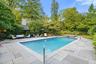 View of pool and spa with exeptional landscaping and privacy