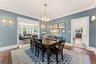 View of the dining room flow between the living room and kitchen for easy guest entertainment