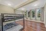 Bdrm One - Ground level bedroom/office with closets and seprate exterior entry