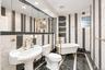 Bathroom One - ground level - pedestal sink, tub and stall shower