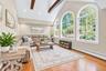 Magnificent Den With Vaulted Ceiling, Gleaming Hardwood Floors & Windows Overlooking Yard