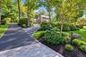 2 Driveways! One Leading to the 2 Car Garage With No Steps, and Circular Driveway With Steps and Walkway to Front Door