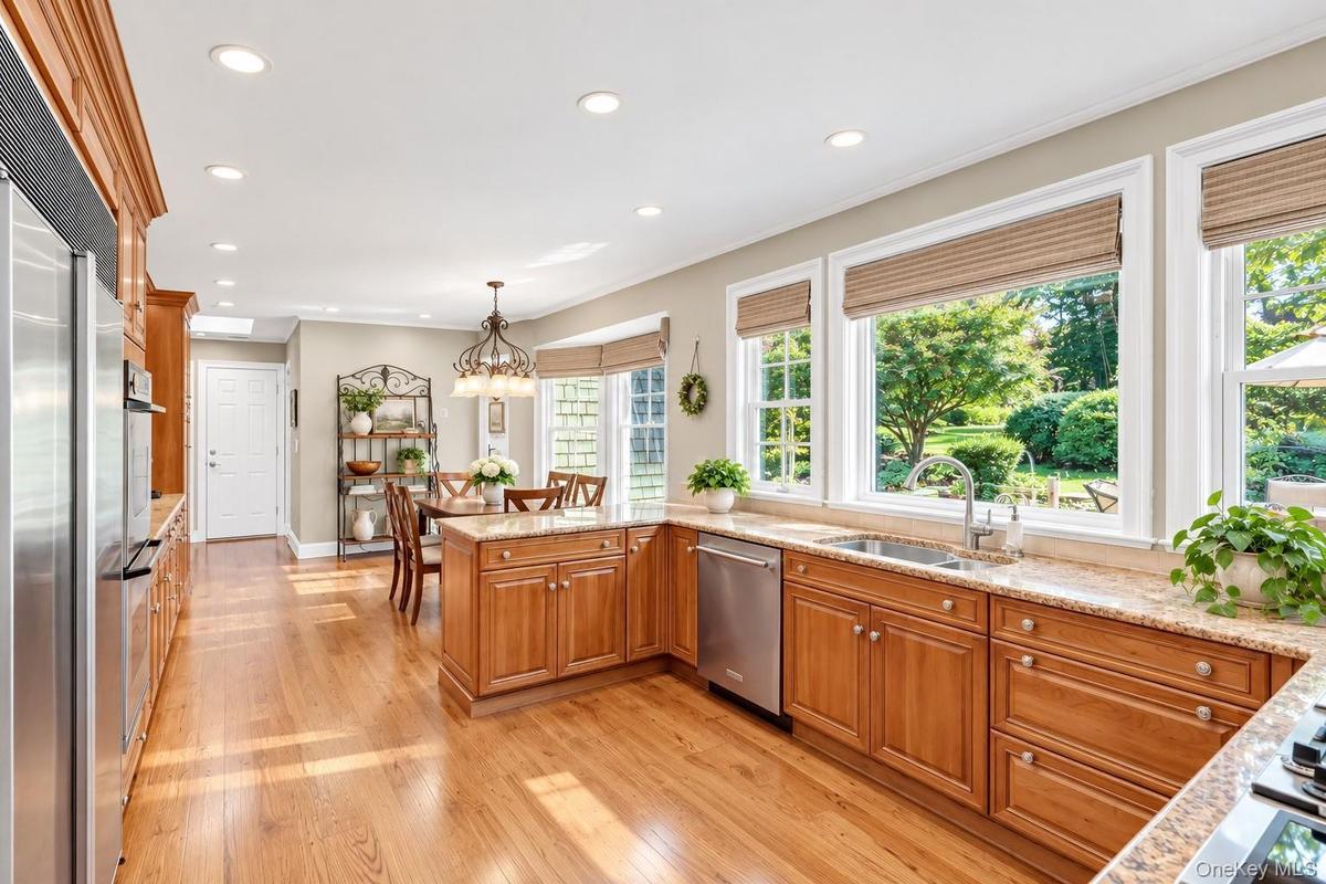 Custom Kitchen With Cherry Cabinets, Granite Counters, Professional Appliances & Gleaming Hardwood Floors