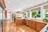 Custom Kitchen With Cherry Cabinets, Granite Counters, Professional Appliances & Gleaming Hardwood Floors