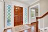 Entry Foyer With Custom Door and Beautiful Leaded Glass Sidelights