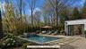 Conceptual rendering illustrating a potential pool utilizing a portion of the existing heated six-car garage as a future pool house. Pool not currentl