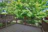 Expansive outdoor deck with composite decking and full railing