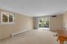Lower Level Den with Sliders to Yard