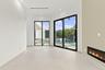 Recessed lighting, tile flooring, two sets of glass sliding doors, built-in fireplace, and a private pool