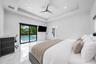 Recessed lighting, modern ceiling fan, tray ceiling, sliding glass doors, and polished tile flooring