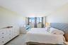 White walls with light-colored flooring