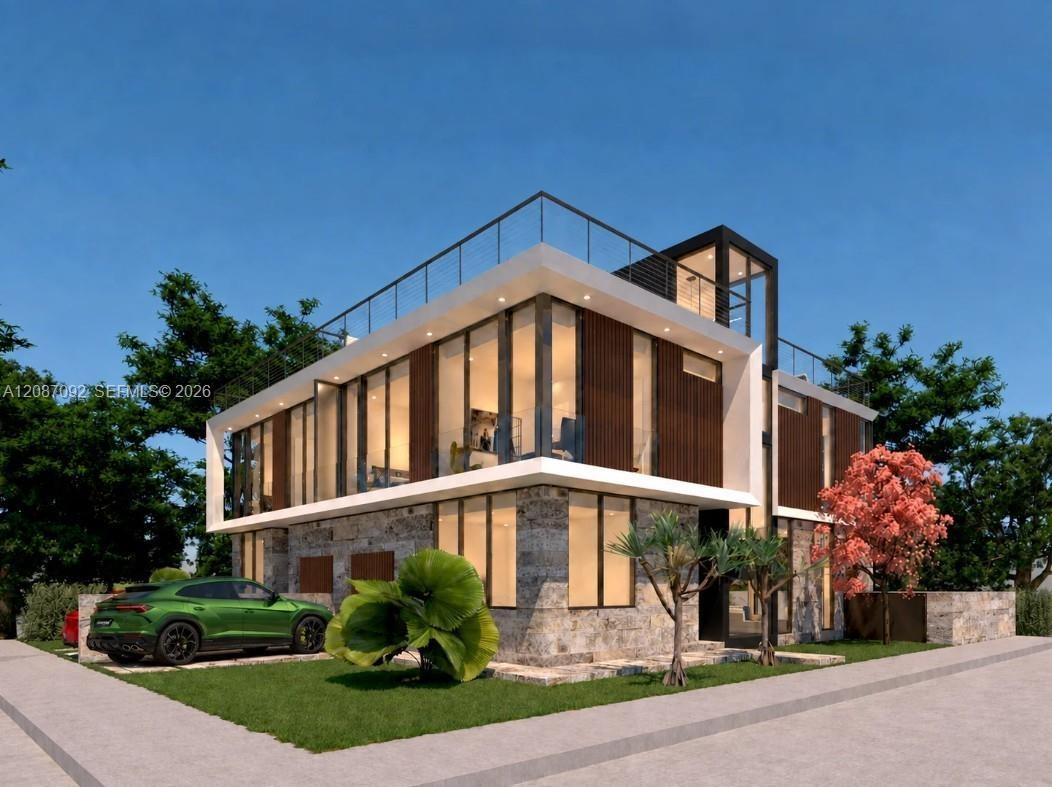 Modern architectural design featuring expansive glass walls, stone facade, multiple balconies with metal railings, and a flat roofline