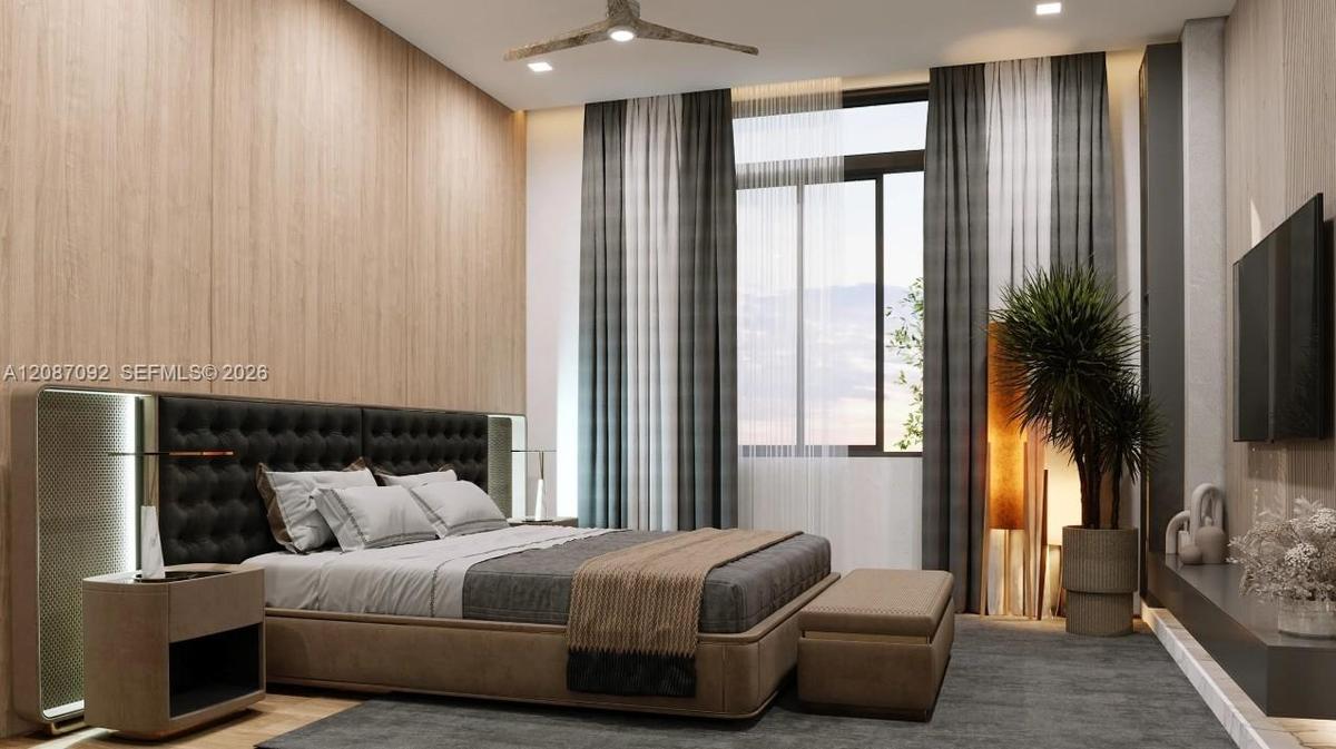Wood-finish accent wall with integrated sconce lighting, recessed ceiling lighting, a contemporary ceiling fan, and a large window with privacy sheers