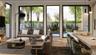 Open concept living area with wood-finish flooring