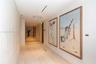 Recessed lighting, wood-finish flooring, and white walls