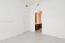 Tile flooring, recessed lighting, and a neutral color palette